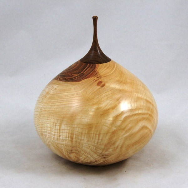 Hand turned wooden hollow form/burial urn made of Ash with a walnut finial