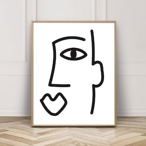 以下が含まれることがあります： 1つの目、鼻、口を持つスタイリッシュな顔の白黒の線画プリントです。