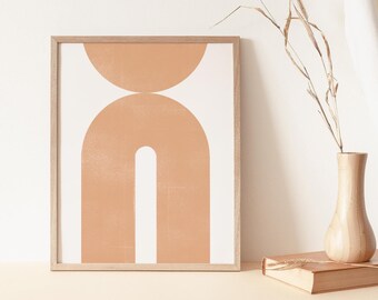 May include: A framed print with a minimalist abstract design featuring two peach-colored arches on a white background.
