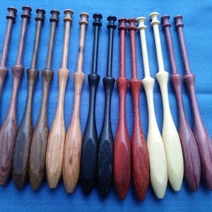 International Square bobbin lace bobbins, smaller heads.  Space saver for your pillow as they fan out.  Limited quantity 19.50dz Guatambo