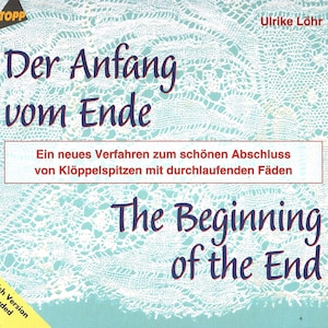 May include: A book cover with the title "Der Anfang vom Ende" in dark blue script over a light blue background with a lace pattern. The English translation "The Beginning of the End" is also displayed.