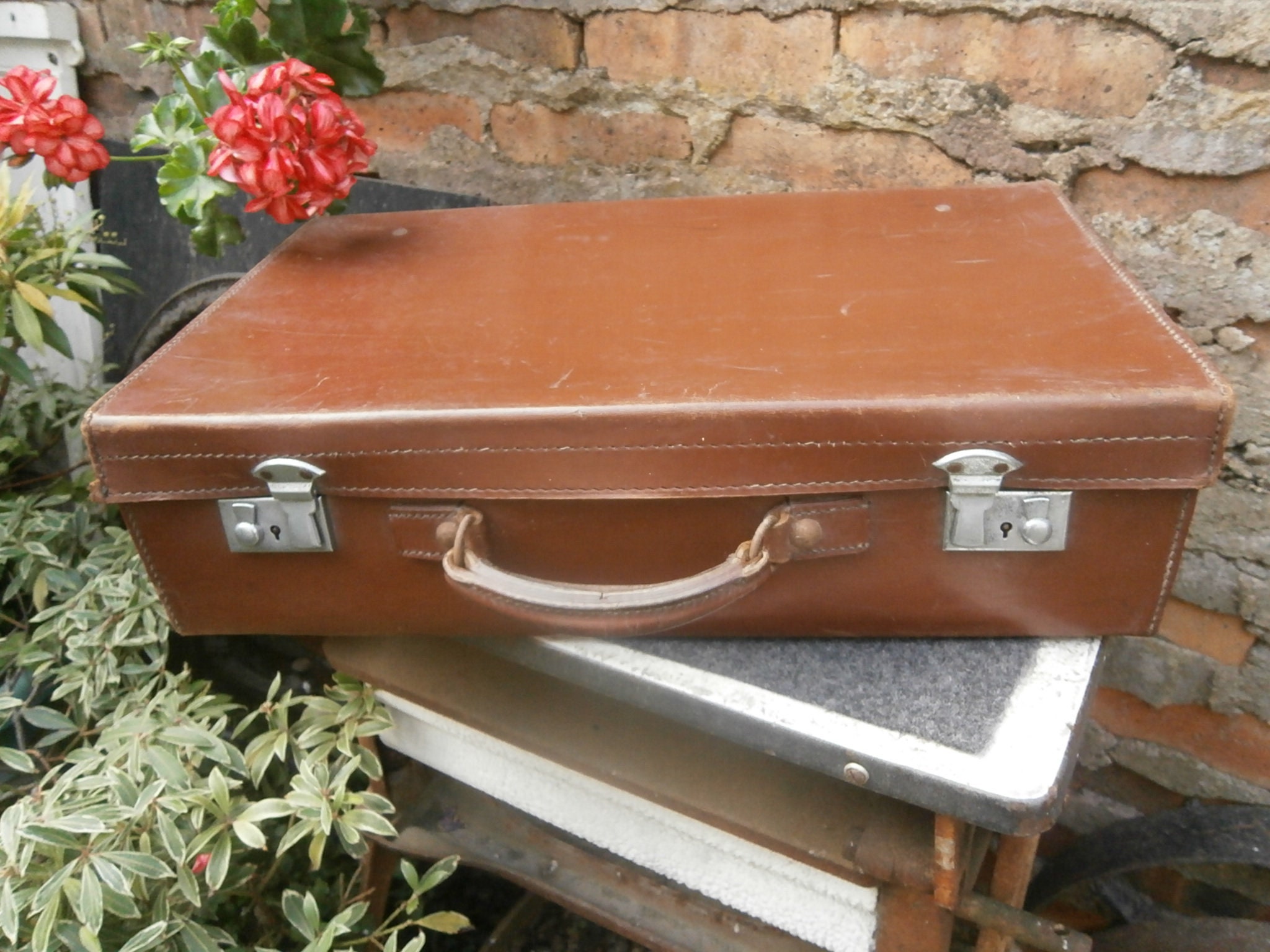 small vintage leather suitcase