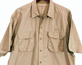 Eddie Bauer Chemise technique tissée à manches longues pour homme, col UPF 50, chemise boutonnée pour la randonnée, la pêche et le travail en plein air pour homme, Bleu, Grand