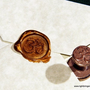 Cachet de cire Om