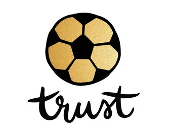 May include: A black and gold soccer ball with the word "trust" written in black cursive below it.