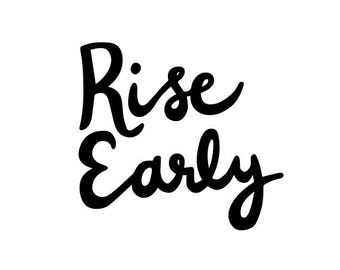 May include: Black and white hand-lettered text that reads "Rise Early".