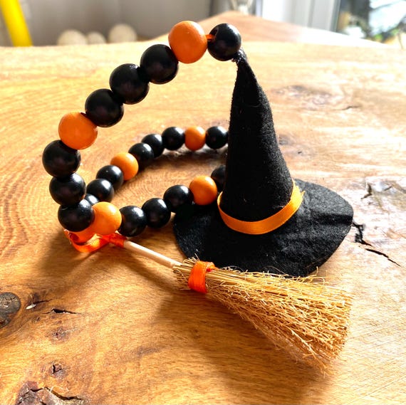Adorable 50cm long bead garland with with hat and broomstick - perfect for Halloween tiered trays