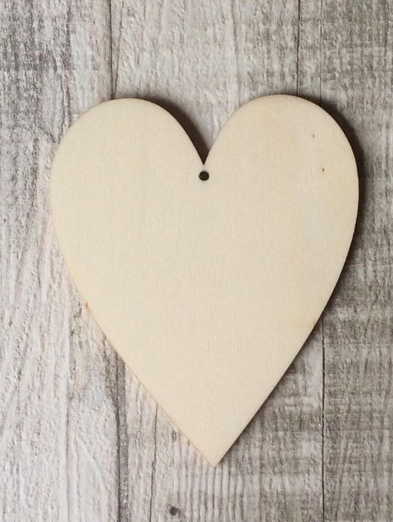pack of 10 unpainted laser cut traditional shaped hearts with a choice of one hole, two holes, no holes or slits