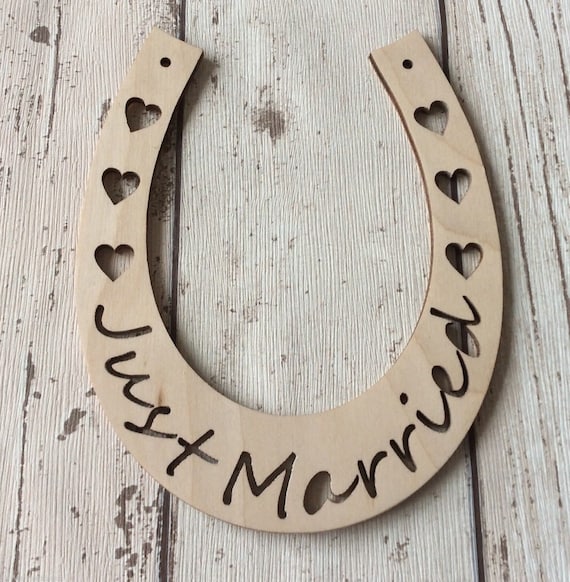 pack of 10 unpainted laser cut Just Married East of India style horseshoes with heart cutout perfect for wedding crafting