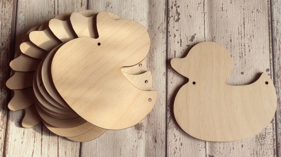 pack of 10 unpainted laser cut baby ducks available with or without holes perfect for baby shower