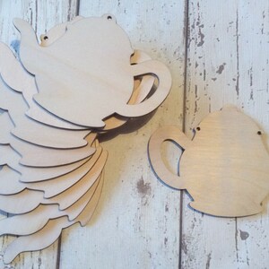 pack de 10 teteras de madera cortadas con láser sin pintar perfectas para elaborar guirnaldas con ranuras o agujeros