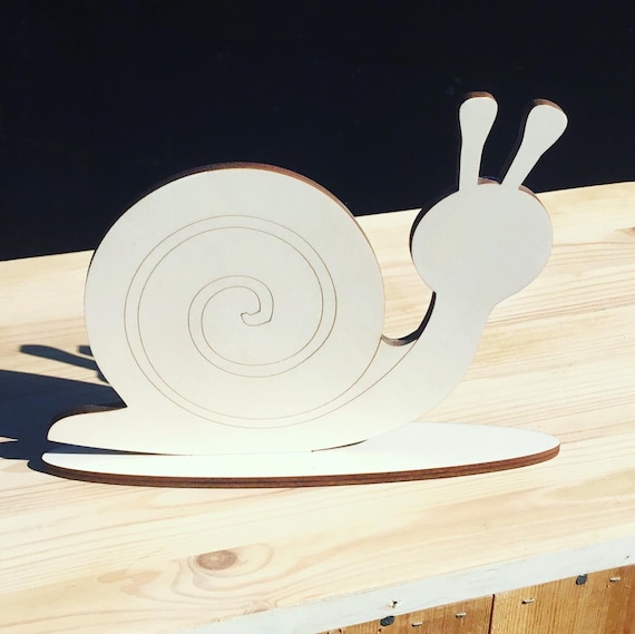 Gorgeous laser cut wooden snail on plinth