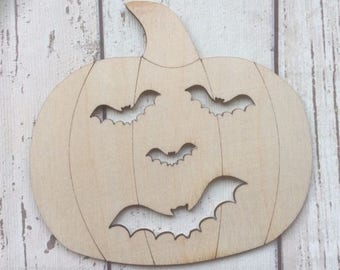 Cute laser cut wood pumpkin bat face heads in packs of three, five or ten