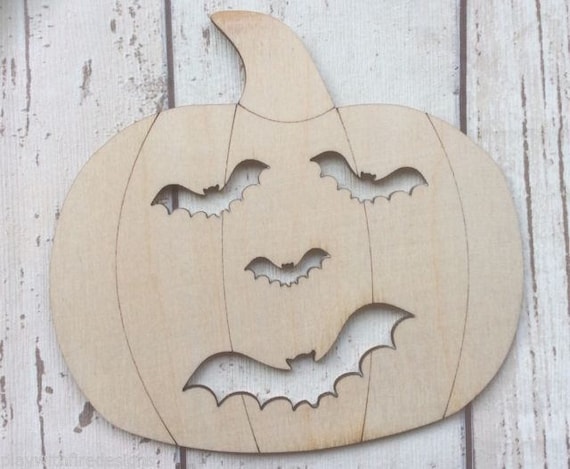 Cute laser cut wood pumpkin bat face heads in packs of three, five or ten