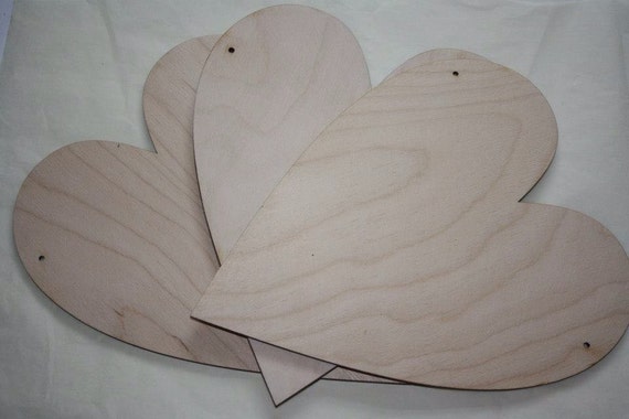 Pack of three large 20cm unpainted laser cut birch plywood hearts, perfect for crafting