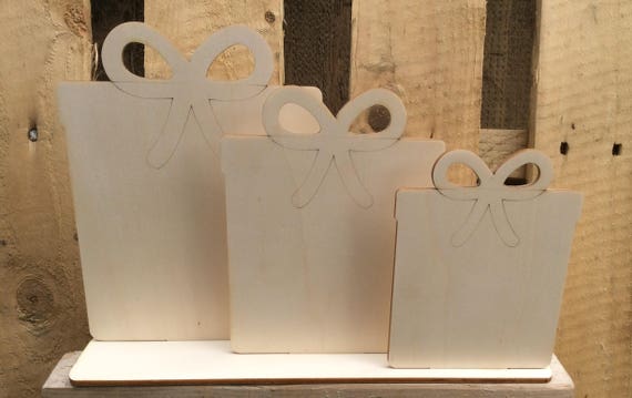 Gorgeous set of three gift box freestanding presents - beautifully laser cut from Italian poplarwood 20cm, 17cm and 14cm on plinth