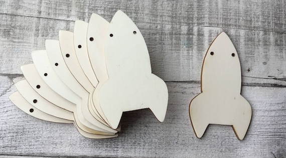 Pack of ten unpainted laser cut wood NEW rocket shapes - no holes, one hole or two holes,  perfect for boys room or nursery