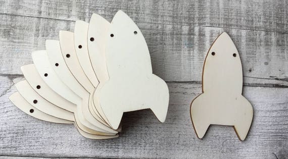 Pack of ten unpainted laser cut wood NEW rocket shapes - no holes, one hole or two holes,  perfect for boys room or nursery