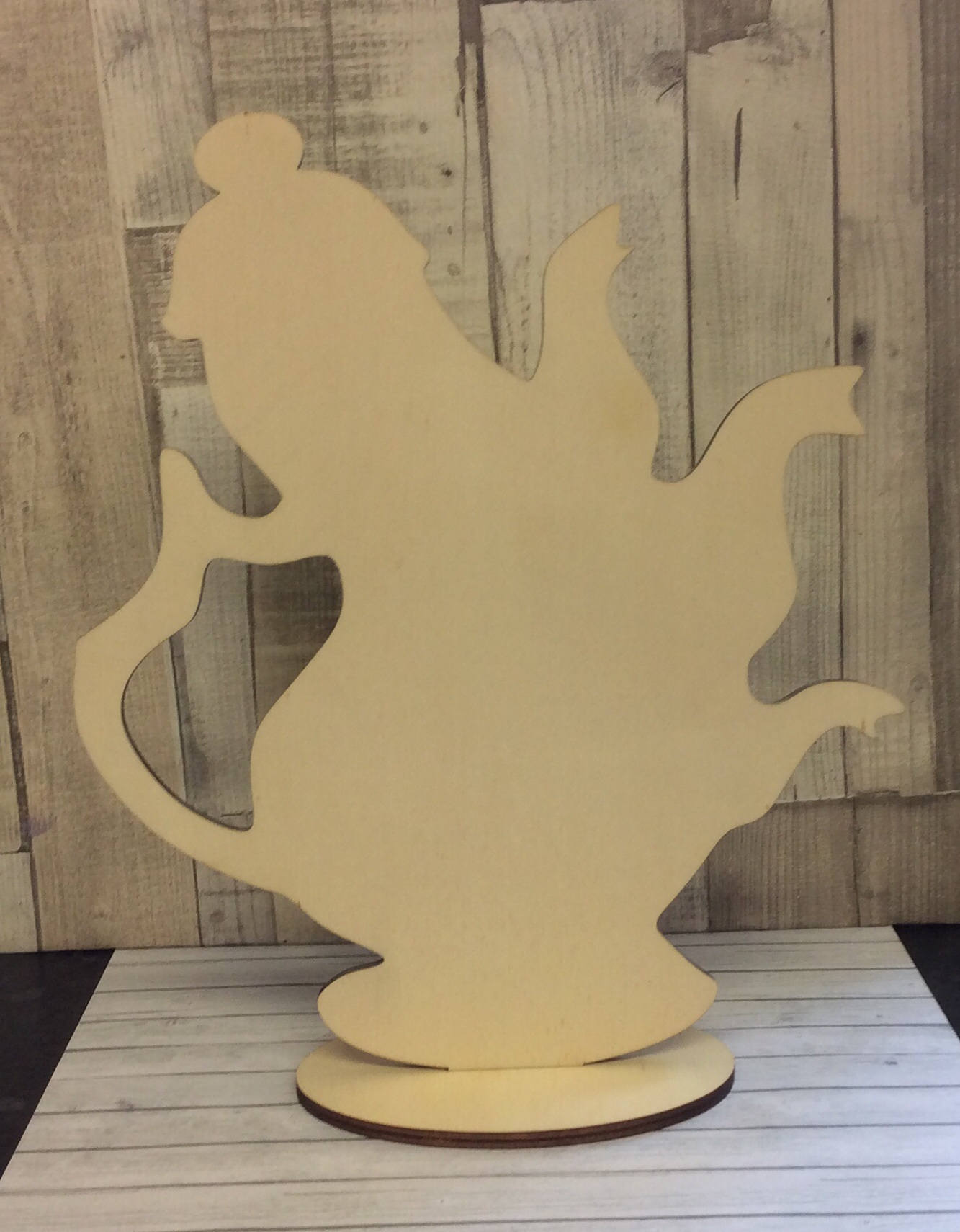 Unpainted laser cut freestanding giant Mad Hatters Tea Party teapot