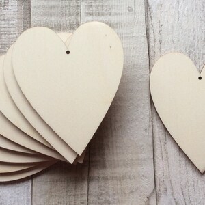 paquete de 10 corazones cortados por láser sin pintar perfectos para la elaboración