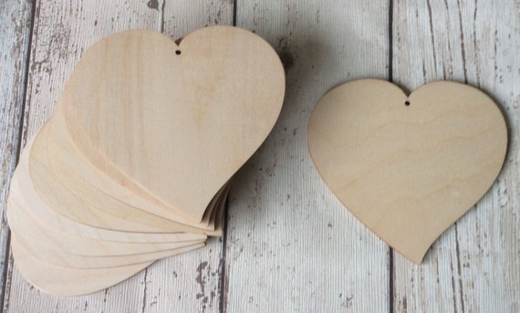 pack of 10 unpainted laser cut irregular shaped hearts with a choice of one hole, two holes, no holes or slits