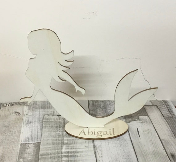 Beautiful personalised wood mermaid on plinth