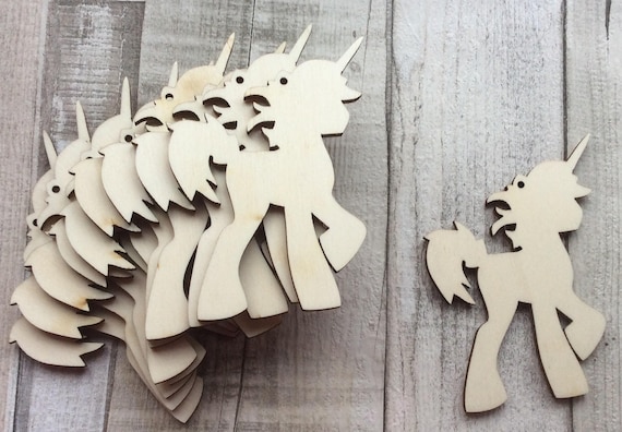 Pack of ten laser cut adorable unicorns for tags or embellishments available with hole or without hole