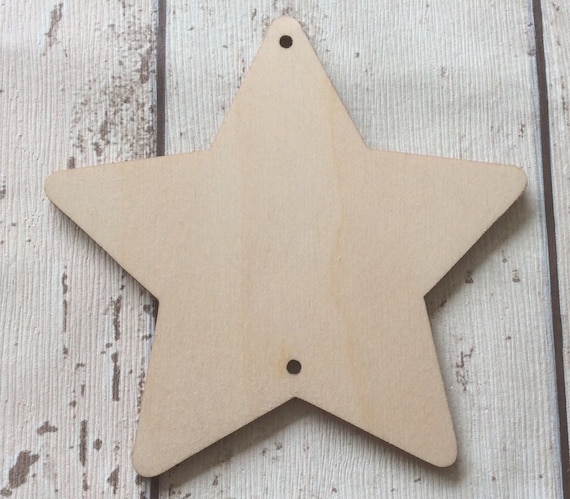 pack of 10 unpainted laser cut stars (choice of 2 sizes)  with two holes perfect for vertical garland or bunting