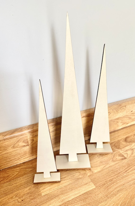 Single unpainted tall slim laser cut wood Christmas trees perfect for crafting - freestanding on plinth available in 3 different sizes