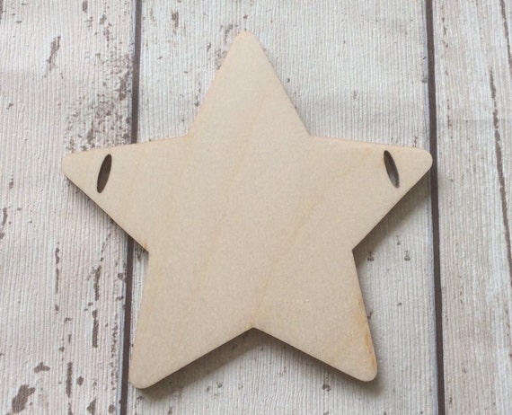 pack of 10 unpainted laser cut stars with two slits perfect for garland or bunting using ribbon