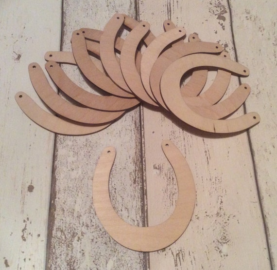 pack of 10 unpainted laser cut  horseshoes perfect for wedding crafting available in two sizes