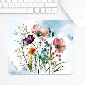 May include: A watercolor painting of a bouquet of colorful flowers against a blue sky background. The flowers include pink, purple, orange, and blue blooms.