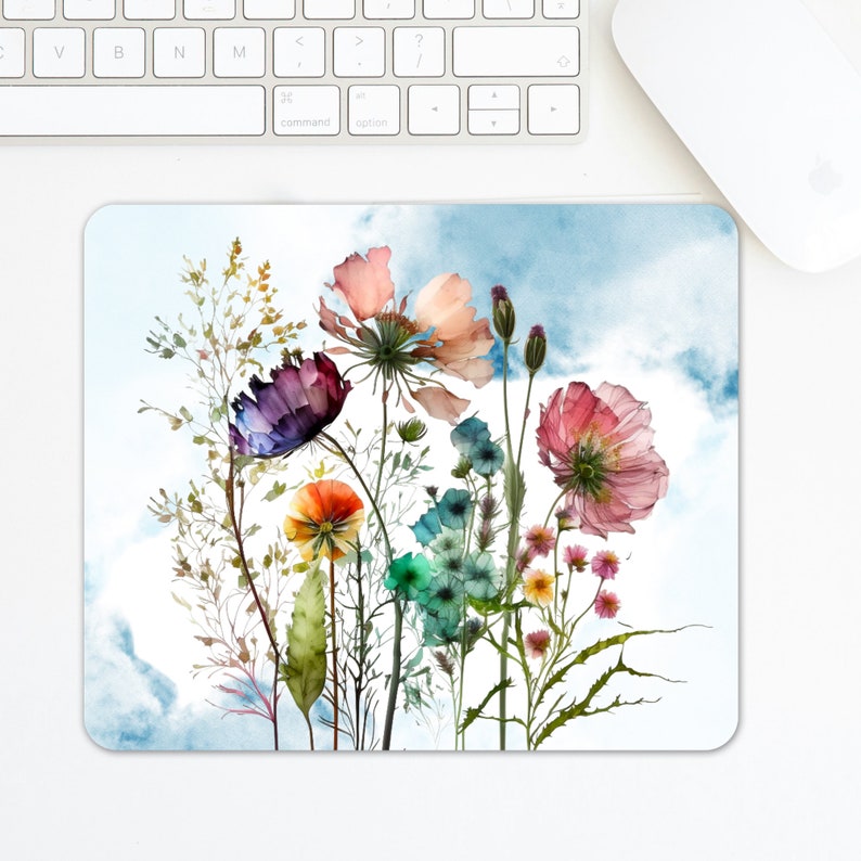May include: A watercolor painting of a bouquet of colorful flowers against a blue sky background. The flowers include pink, purple, orange, and blue blooms.