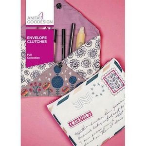 May include: Two fabric envelope clutches, one with a floral design and the other with an airmail design. The clutches are made of a white fabric with a light brown trim. The floral clutch has a light brown background with blue and red flowers. The airmail clutch has a white background with a blue and green airmail stamp. The text "AIRMAIL" is printed in red on the airmail clutch.