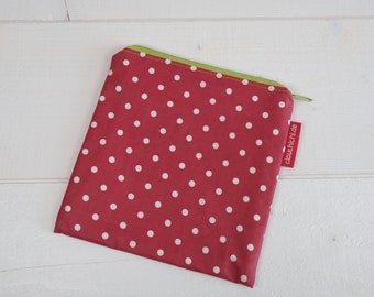 Pocket red with dots of menstrual hygiene and more