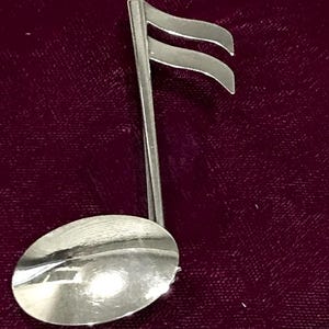 Mooie vintage Danecraft sterlingzilveren muzieknootbroche