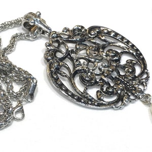Large Vintage Avon Open Work Silver Tone Pendant