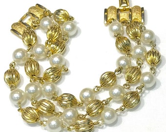 Pretty Vintage Puccini Faux Pearl and Textured Gold Tone Metal Bead Three Strand Bracelet