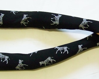 Katoen, gebreide kleding, jersey, zeer lang, grijze print (giraffen) op een zwarte pagina, hippie, fiets, boho, armwarmers met duimgat. IDEAAL voor HAAR
