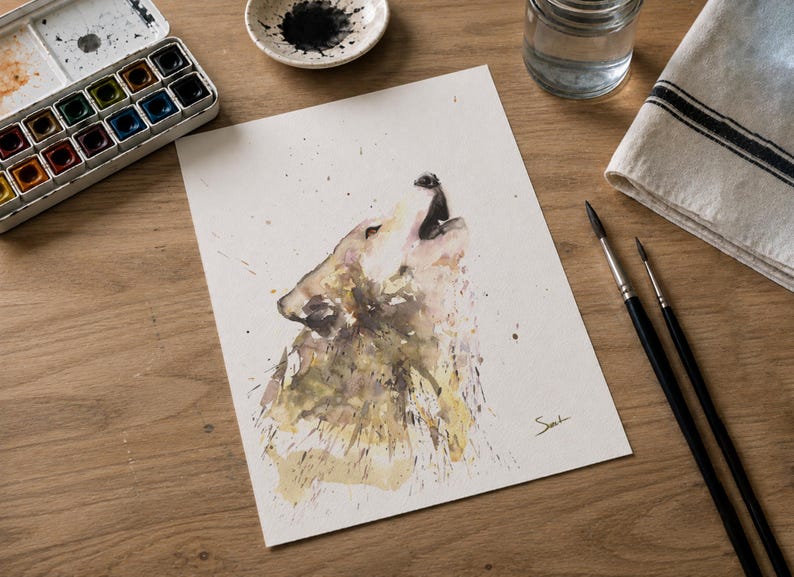 May include: A watercolor painting on white paper depicting a wolf howling with its head tilted upward. The artwork features earthy tones of brown, tan, and muted yellow with paint splatters and a signature in the bottom right corner.