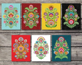 Peut inclure: Six motifs floraux colorés avec des détails complexes. Chaque motif présente une fleur centrale entourée de fleurs et de feuilles plus petites. Les motifs sont dans une variété de couleurs, y compris le rouge, le bleu, le jaune, le vert et le blanc.