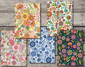 May include: Set of six digital paper designs featuring colorful floral patterns. The designs include a variety of flowers, leaves, and swirls in a variety of colors, including red, blue, green, yellow, and purple.