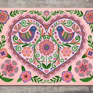 May include: A colorful folk art print featuring a heart-shaped design with two blue birds, flowers, and decorative elements in shades of pink, green, orange, and blue. The artwork is set against a light pink background.