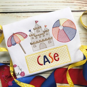 May include: A white t-shirt with an embroidered design of a sandcastle, beach ball, and umbrella. The name "CASE" is embroidered on a yellow rectangle.