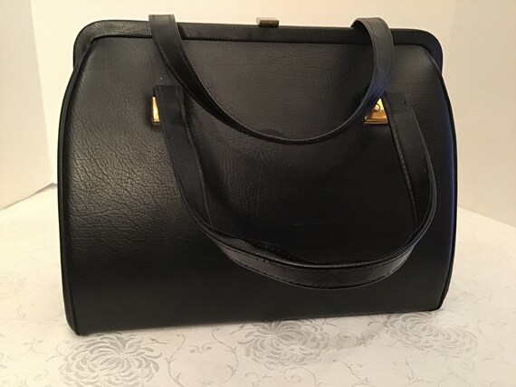 black bag with red lining
