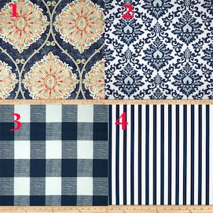 May include: Four fabric swatches in different patterns. The first swatch is a blue and white floral pattern. The second swatch is a white and blue damask pattern. The third swatch is a blue and white buffalo plaid pattern. The fourth swatch is a blue and white striped pattern.