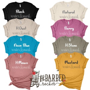 May include: A set of ten t-shirts in various colors, each with a different color and the text "water mark" printed on the front. The text is in white and the shirts are arranged in two rows of five. The shirts are all the same style and have a relaxed fit. The shirts are made of a soft, comfortable material and are perfect for everyday wear.