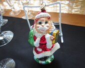 Christopher Radko Vintage Christmas Ornament-Santa Kitty delivering gifts to friends