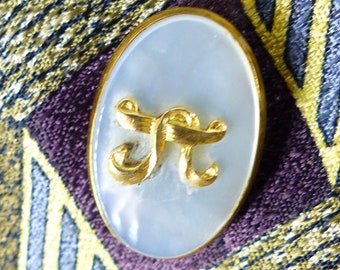 Magnetic tie tack Mag TAK. Gold Chinese symbol with mother of pearl background. Silk covered back button. Don't poke holes in your fabrics