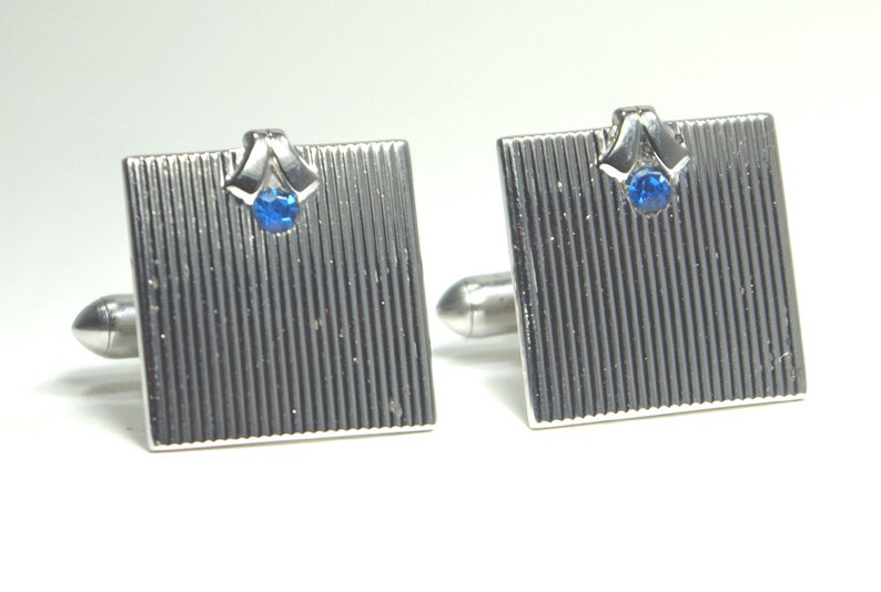 Very Don Draper Square Elegant pair of vintage Swank wedding cufflinks in grooved silver and black with brilliant blue crystal inset